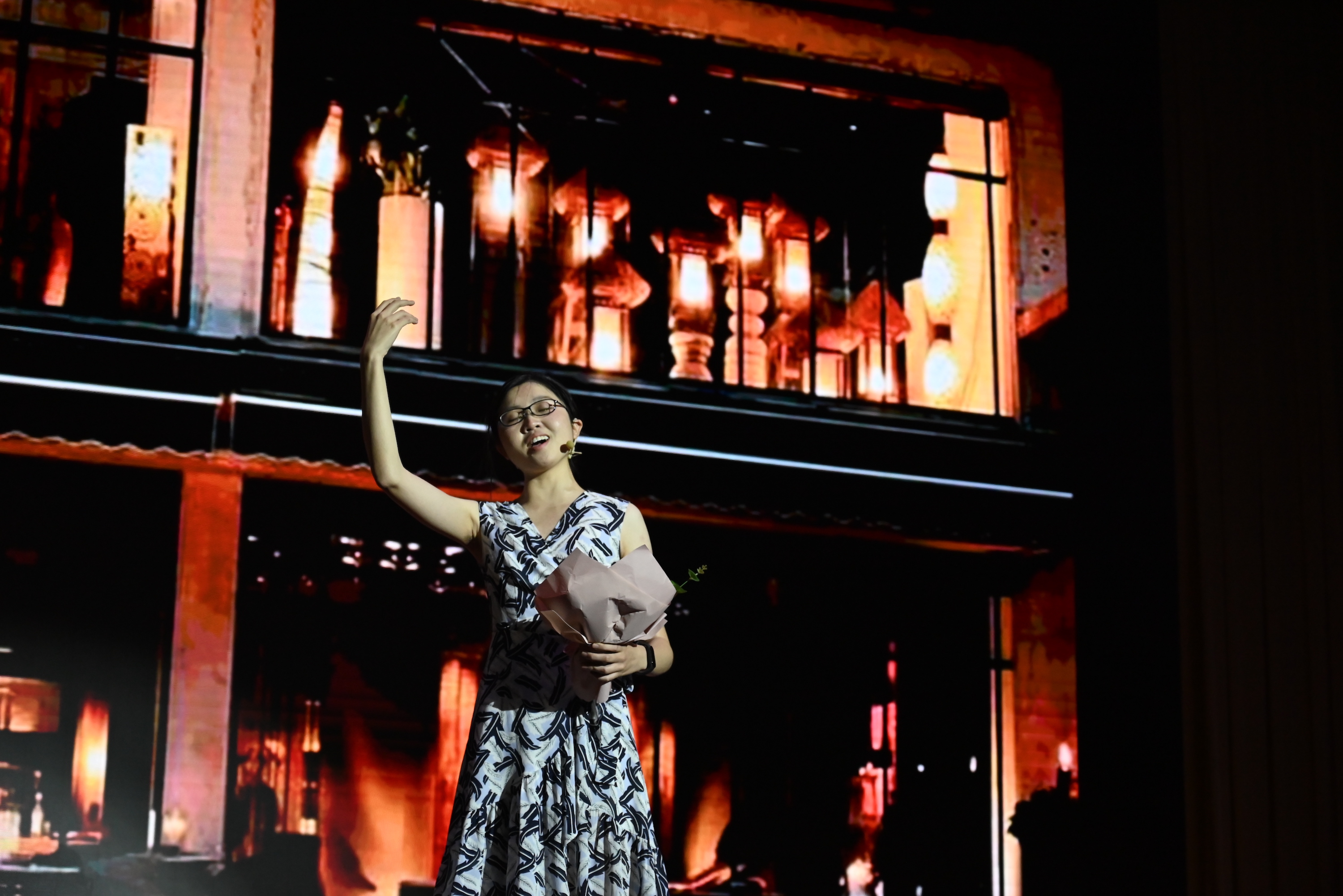 Siqi singing Think of Me at the Student Festival